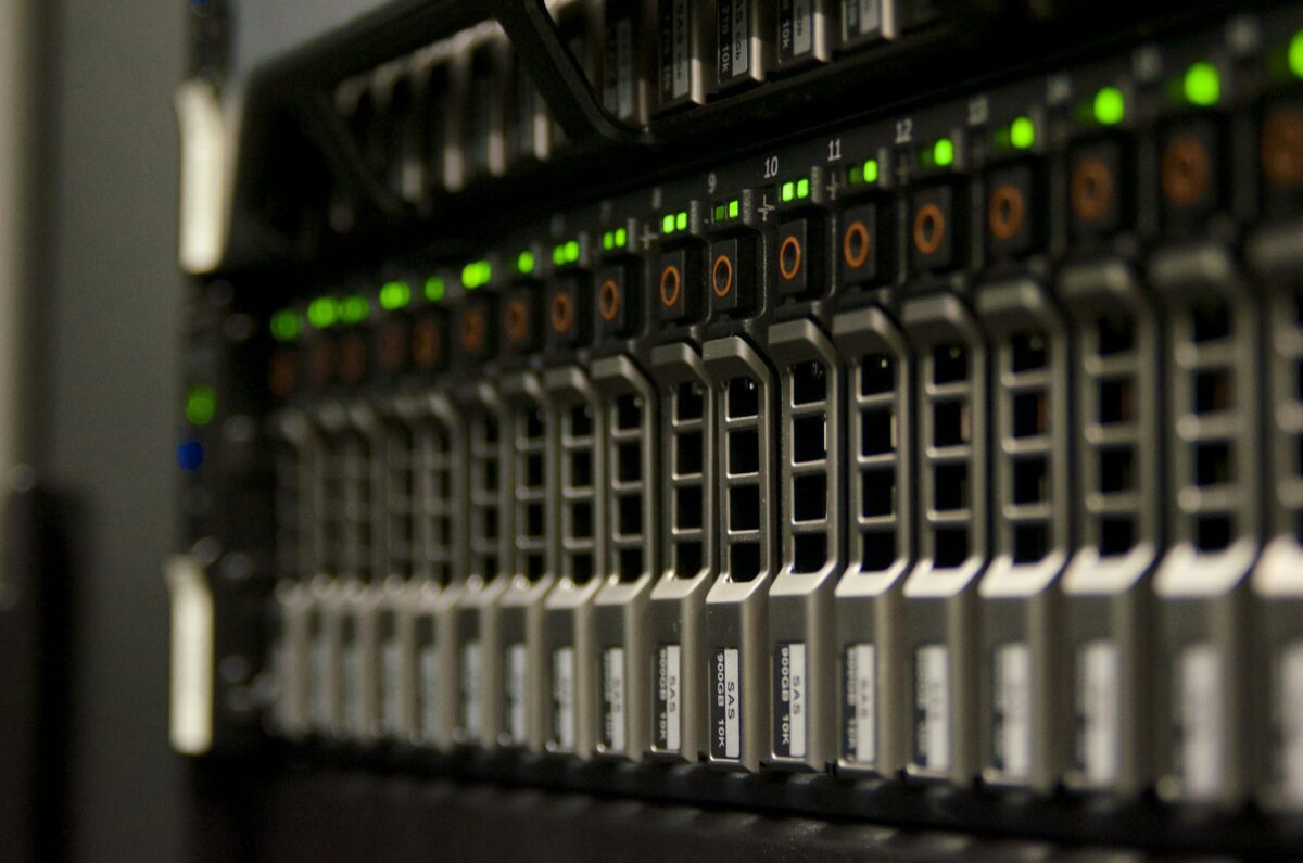 Server rack with green monitoring lights